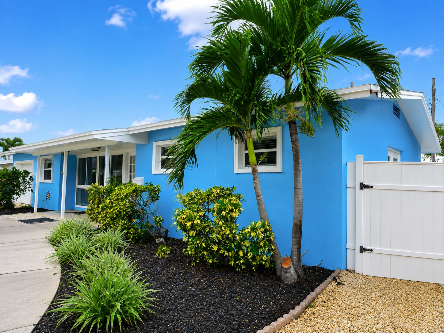Finished exterior paint job on a Florida stucco home