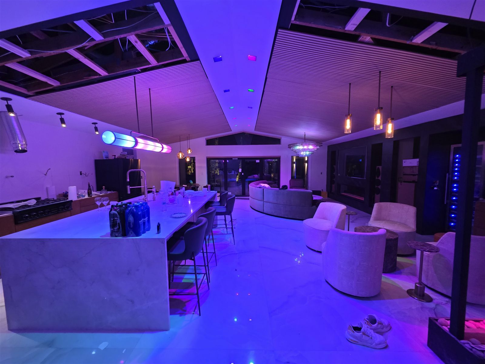 Modern great room renovation with marble floor and custom lighting, Tampa Bay, FL