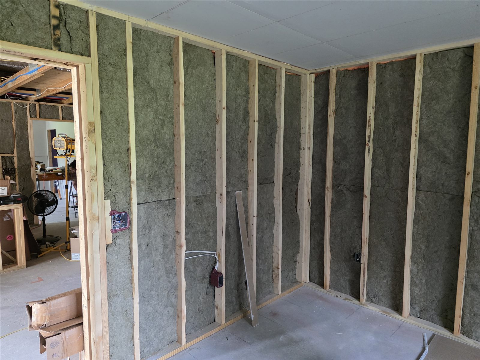 Continuous wall insulation installed before drywall in a Tampa Bay, FL renovation